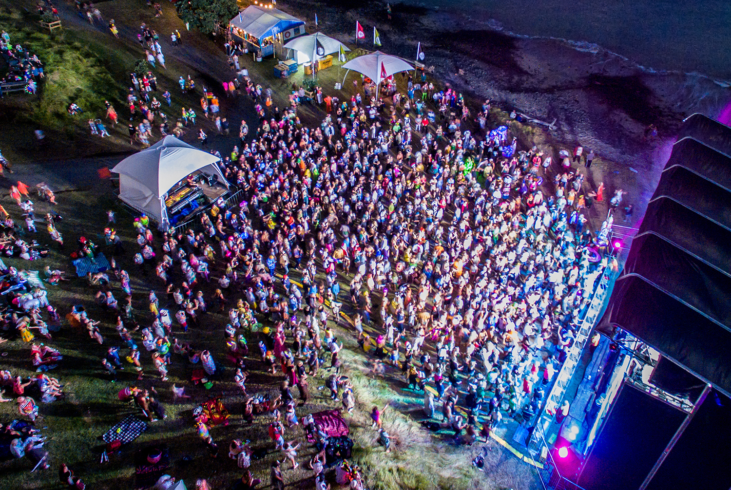 Beachside camping at Splore, Tapapakanga Regional Park